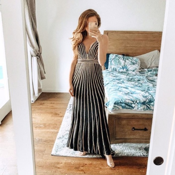 Jovani Dresses & Skirts - Jovani Black & Gold Mermaid Gown Size 10
